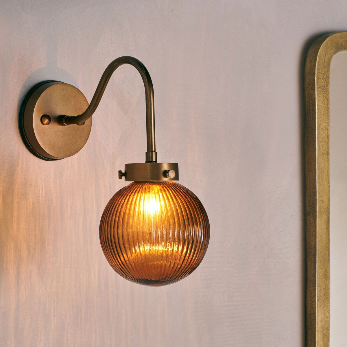 Konnie Amber Glass Bathroom Wall Light In Antique Brass