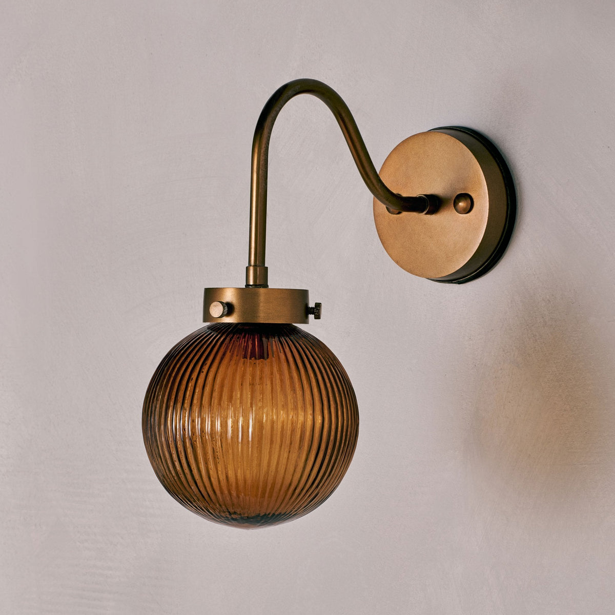 Konnie Amber Glass Bathroom Wall Light In Antique Brass