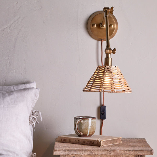 Noko Adjustable Plugged Wall Light in Antique Brass With Rattan Shade