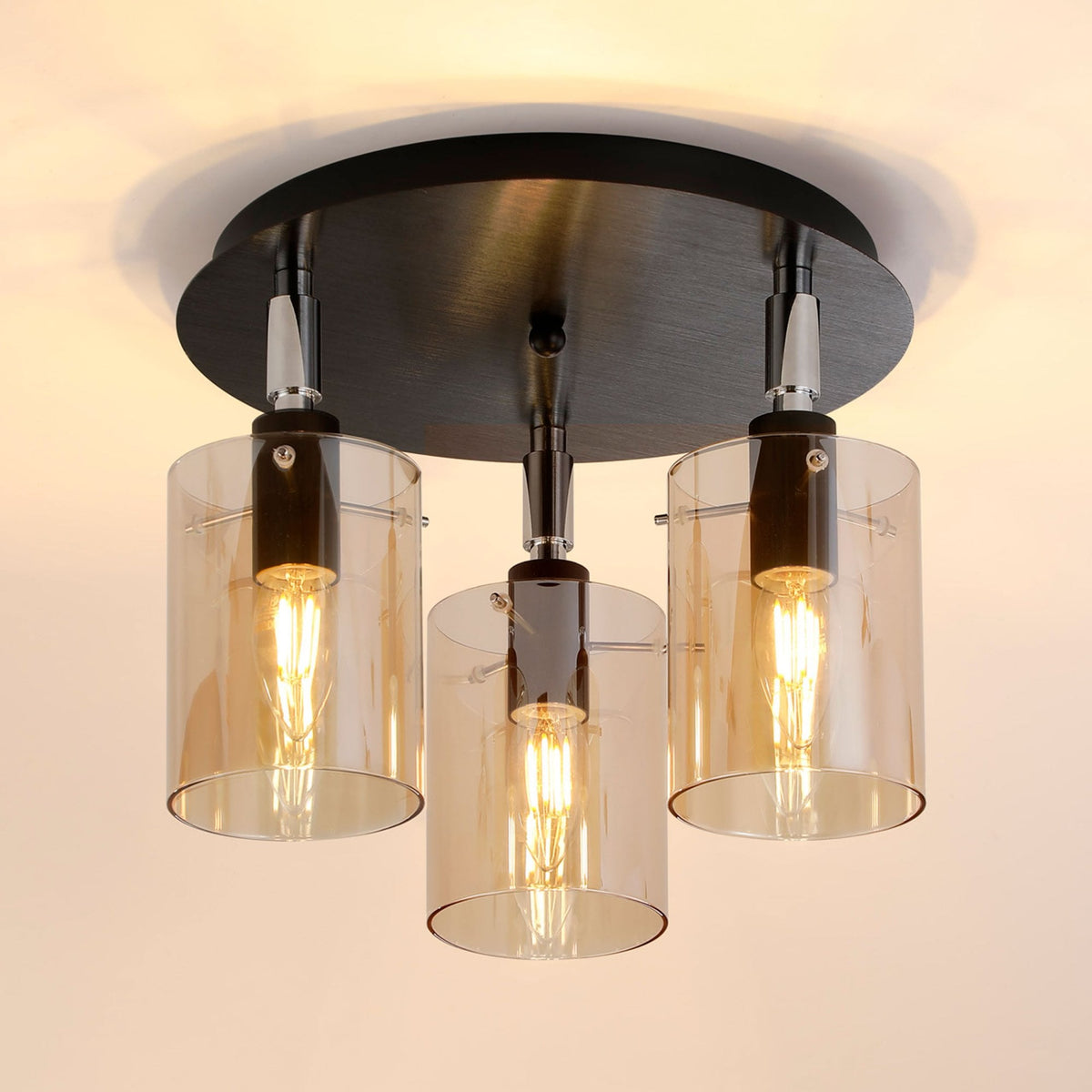 Kidwelly IP44 Triple Lamp Semi Flush Ceiling Light in Black & Chrome with Amber Glass Shades