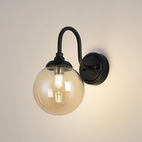 Loughton IP44 Curved Arm Wall Light in Satin Black with Smooth Round Glass Amber Diffuser