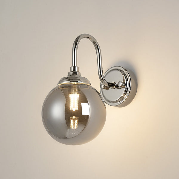 Loughton IP44 Curved Arm Wall Light in Polished Nickel with Smooth Round Glass Smoked Diffuser