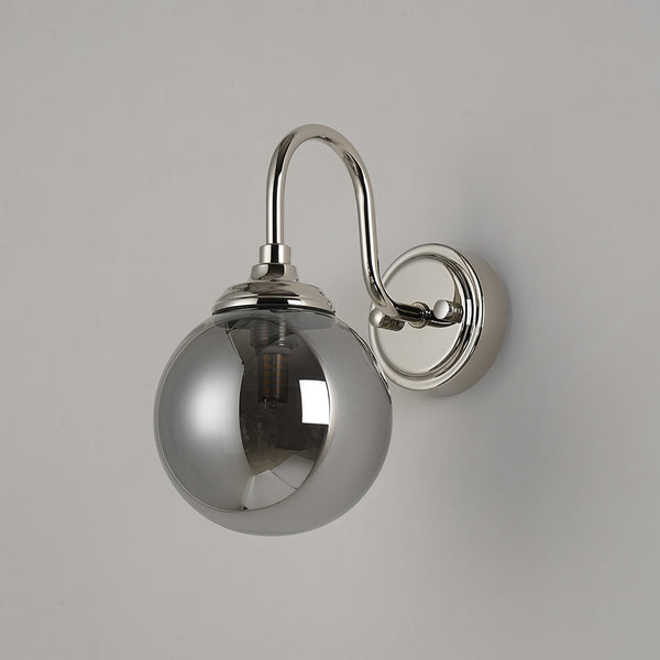 Loughton IP44 Curved Arm Wall Light in Polished Nickel with Smooth Round Glass Smoked Diffuser