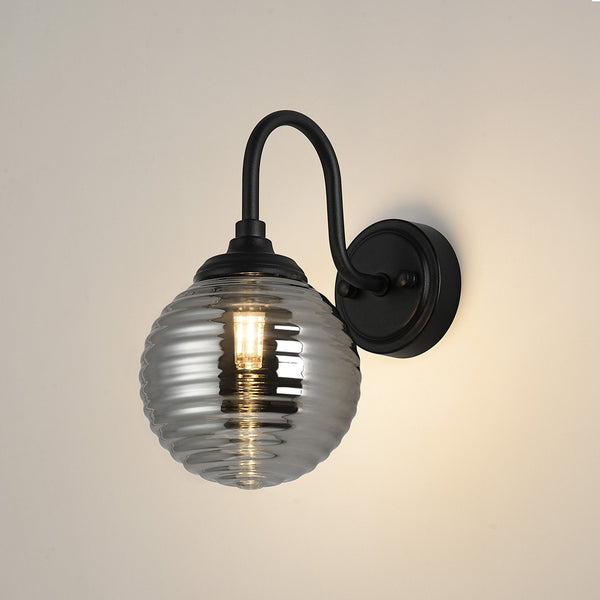 Loughton IP44 Curved Arm Wall Light in Satin Black with Ribbed Round Glass Smoked Diffuser