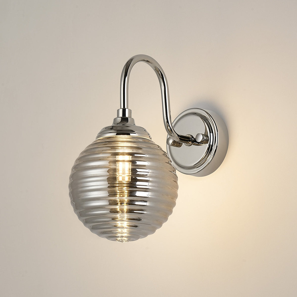 Loughton IP44 Curved Arm Wall Light in Polished Nickel with Ribbed Round Glass Smoked Diffuser