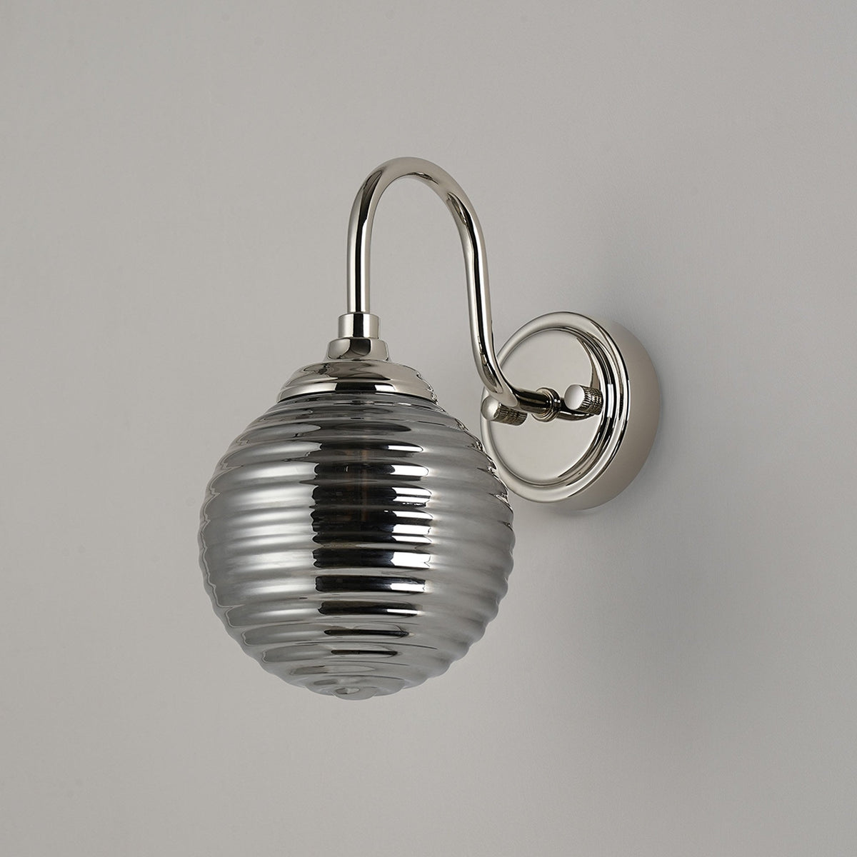 Loughton IP44 Curved Arm Wall Light in Polished Nickel with Ribbed Round Glass Smoked Diffuser