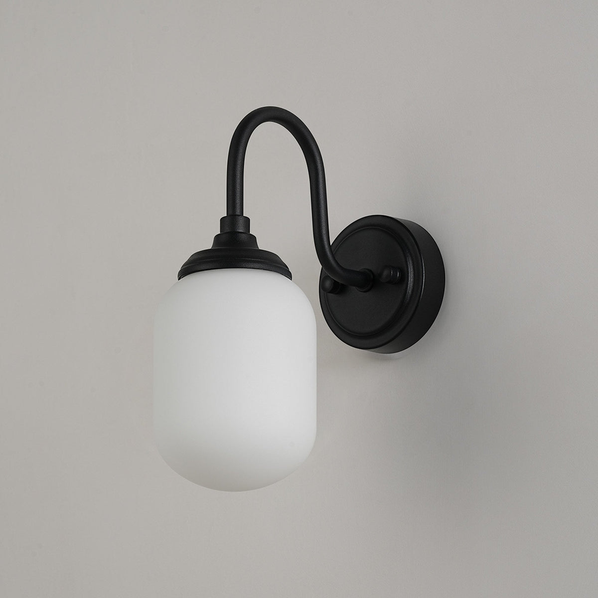 Loughton IP44 Curved Arm Wall Light in Satin Black with Smooth Tubular Glass Opal Diffuser