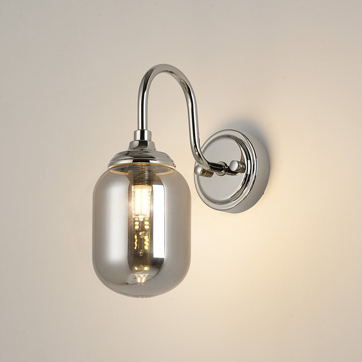 Loughton IP44 Curved Arm Wall Light in Polished Nickel with Smooth Tubular Glass Smoked Diffuser