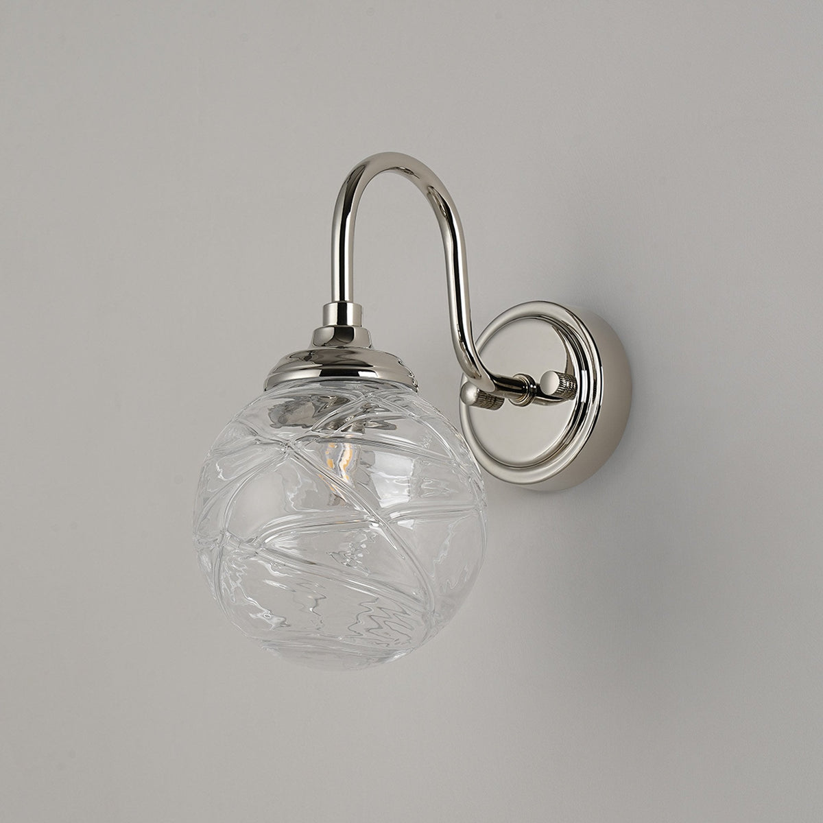 Loughton IP44 Curved Arm Wall Light in Polished Nickel with Dune Effect Round Glass Clear Diffuser