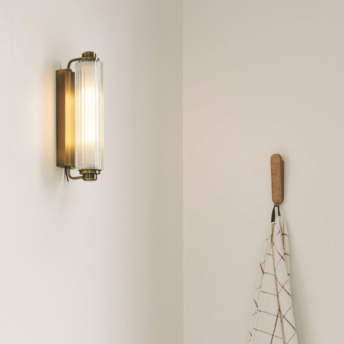Nimal IP44 Bathroom Wall Light in Brass with Opal Diffuser