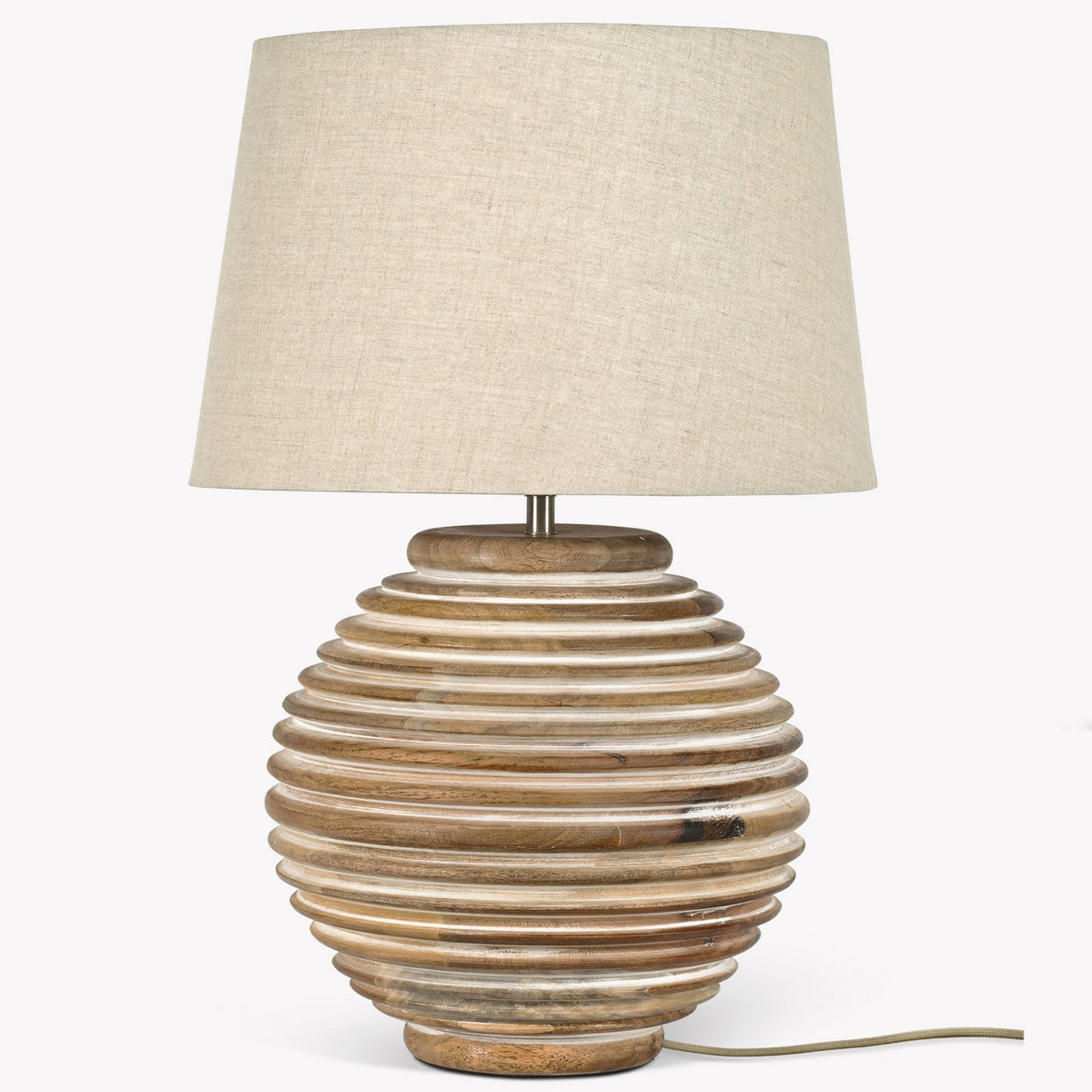Table lamp with a beige fabric shade and a ribbed, light brown wooden base.