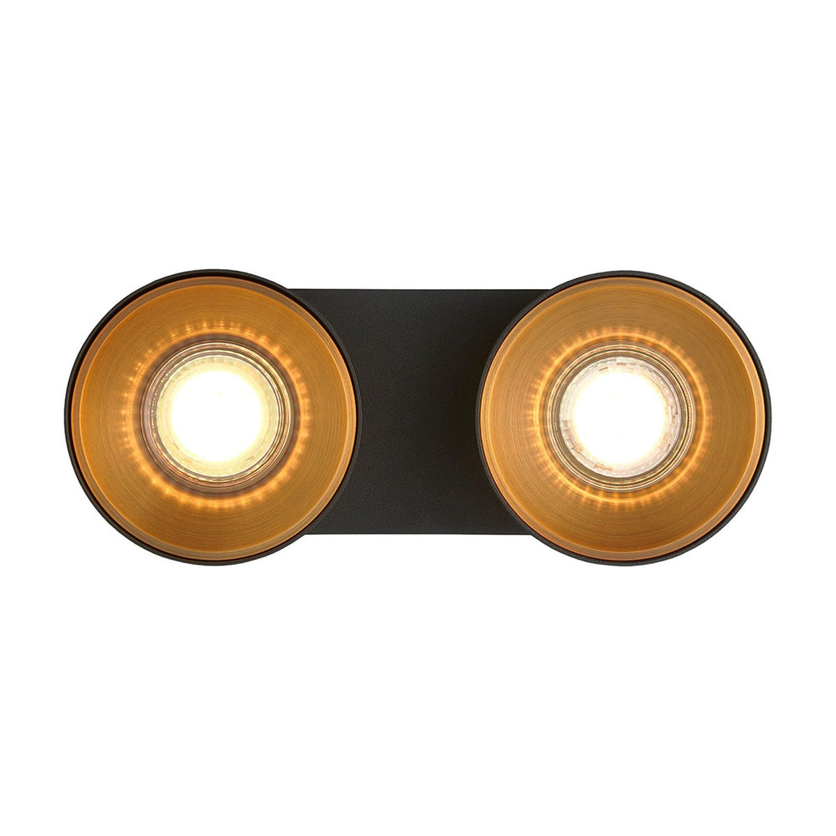 Black wall light with two circular gold-toned lamps, illuminated with warm white light
