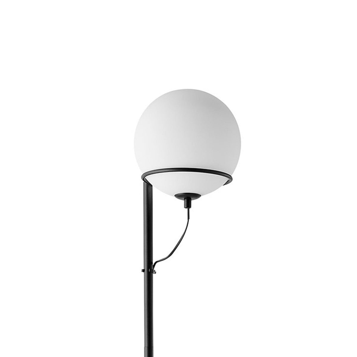 Close-up of the white spherical shade and black support of the floor lamp.