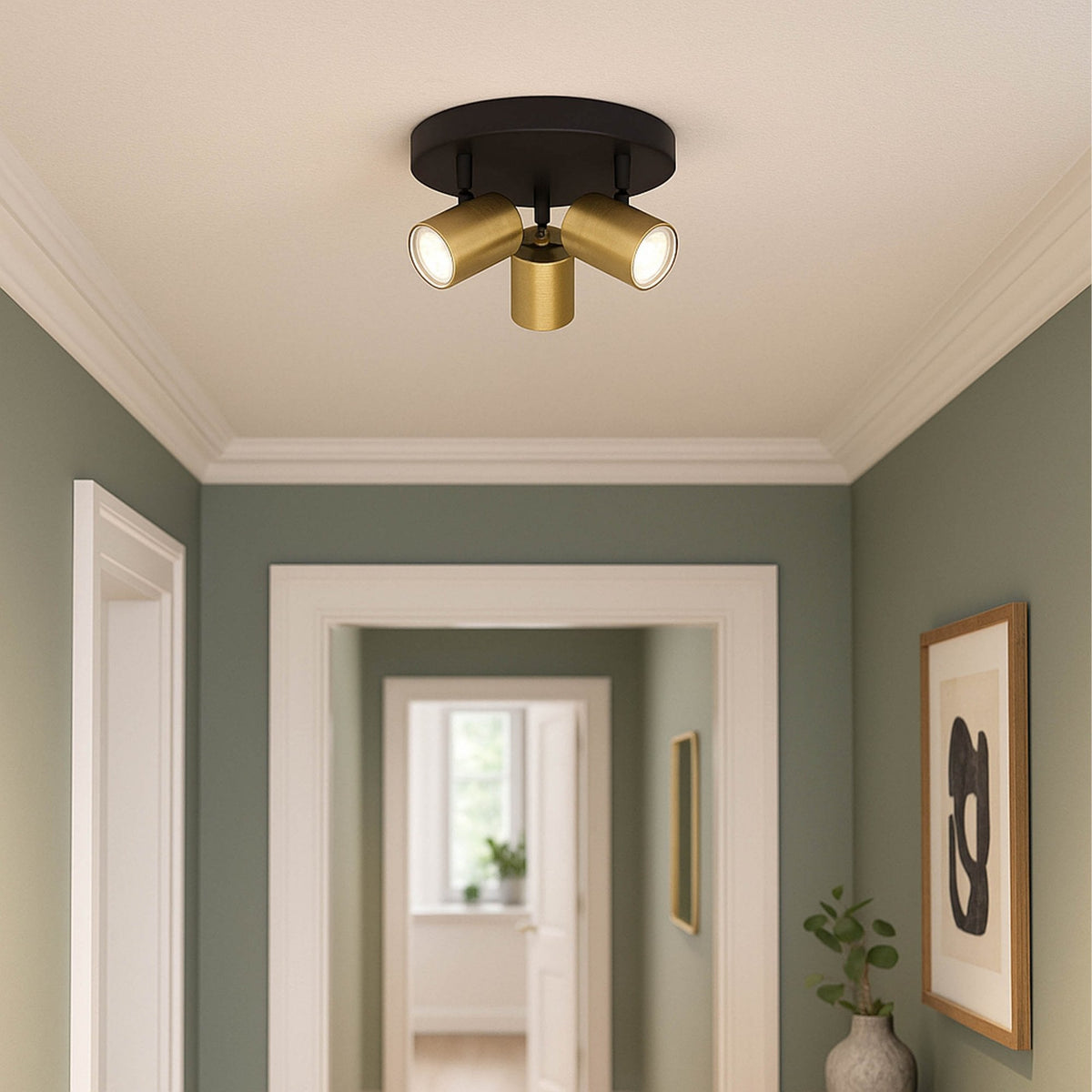 Consuma 1 IP44 Triple Head Round Spotlight in Black and Brushed Brass