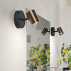 Consuma 1 IP44 Single Spotlight in Black and Bronze