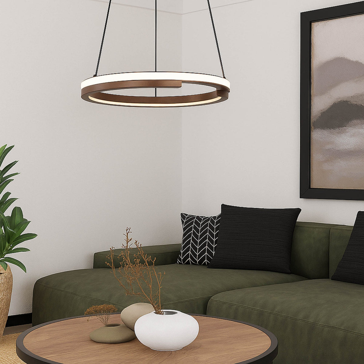 A modern living room with a green sectional sofa, a round wooden coffee table, and a circular pendant light