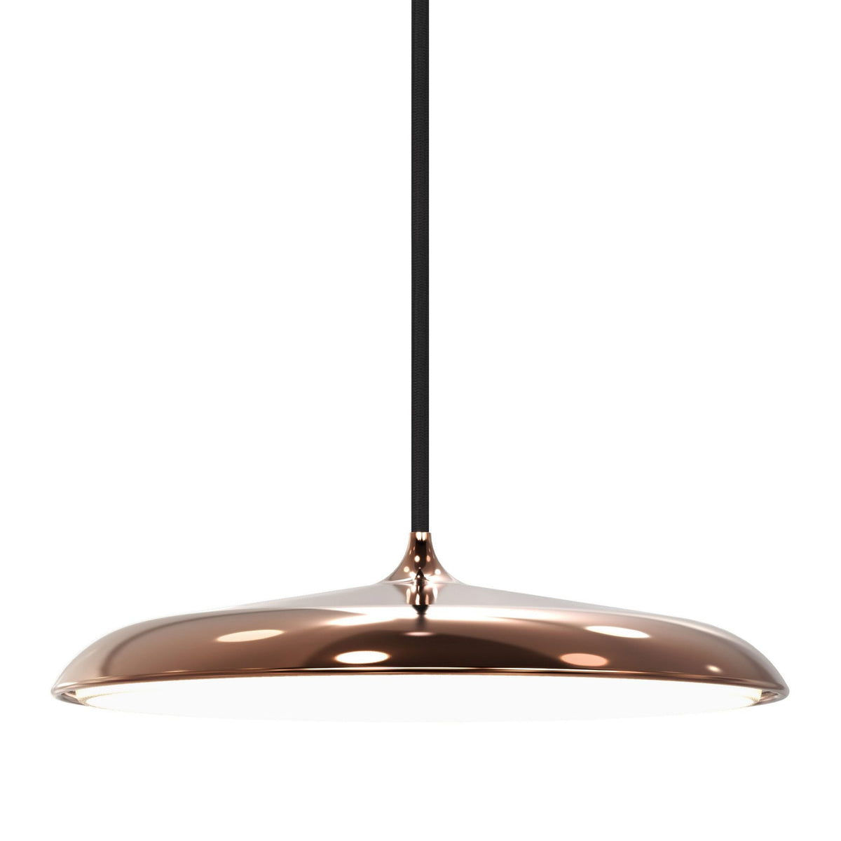 Copper finish pendant light with a subtle glow, highlighting its reflective surface.