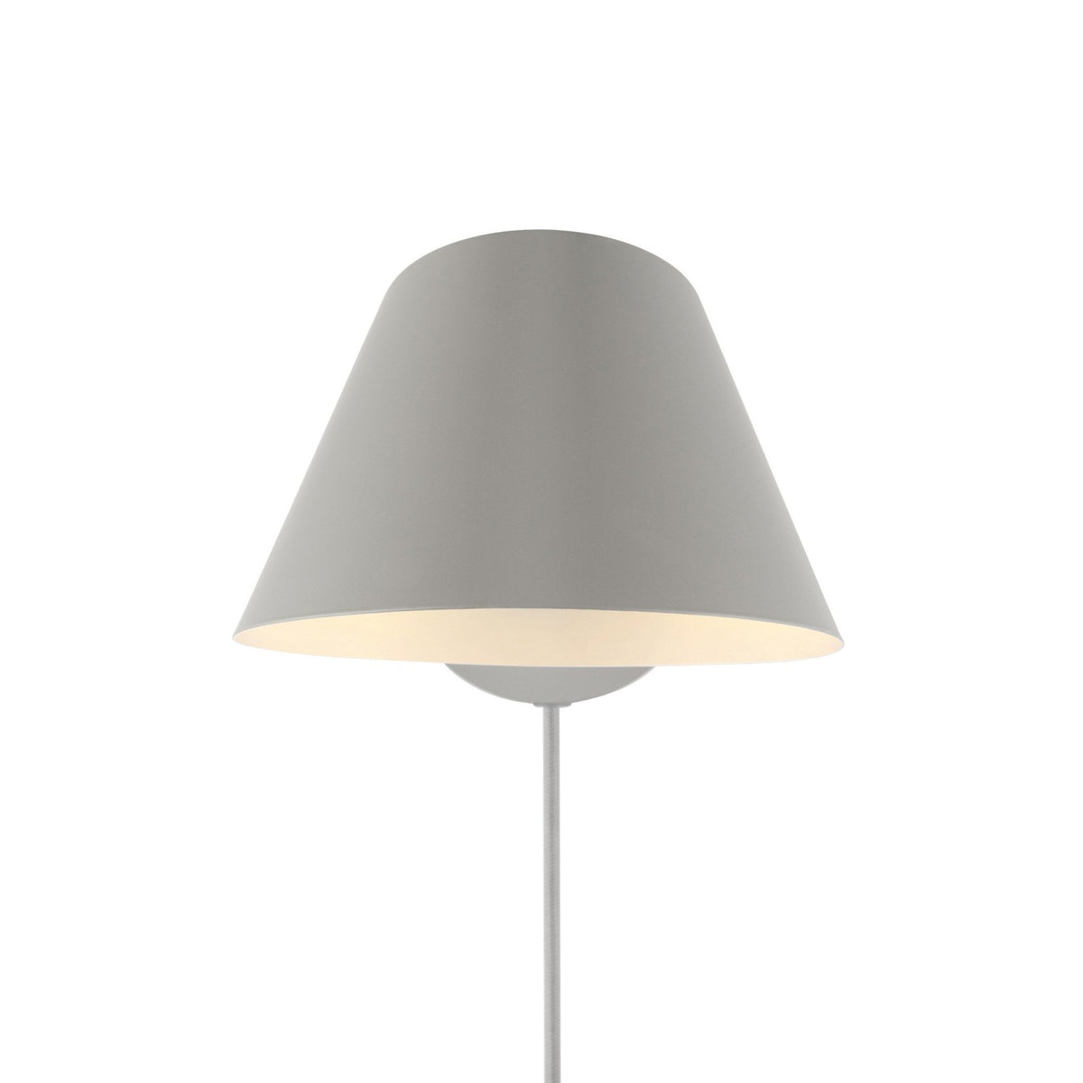 The grey wall lamp, front view, highlighting its shade and light. 