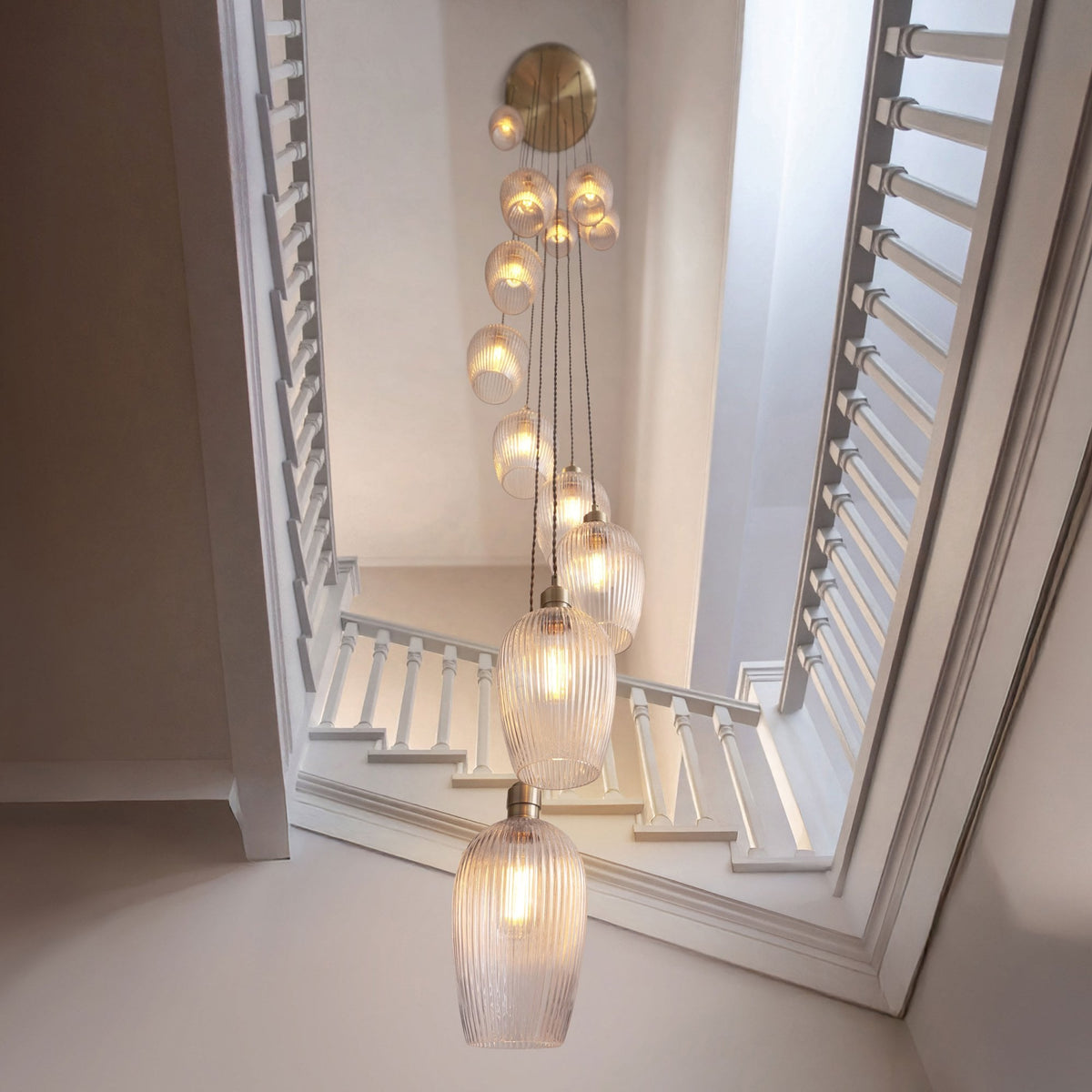 Hoburne 13 Light Cascade Pendant in Antique Brass with Clear Ribbed Glass