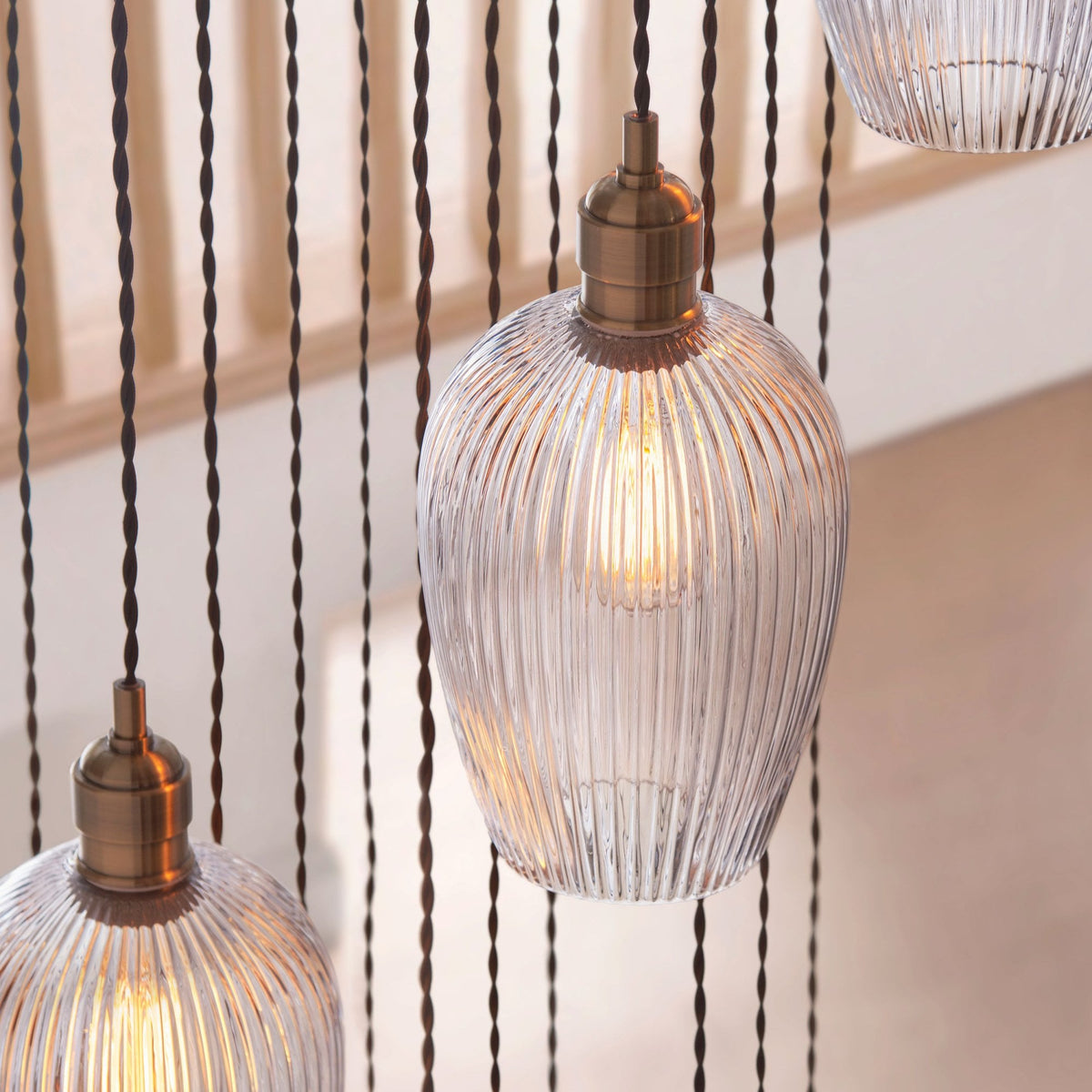 Hoburne 13 Light Cascade Pendant in Antique Brass with Clear Ribbed Glass