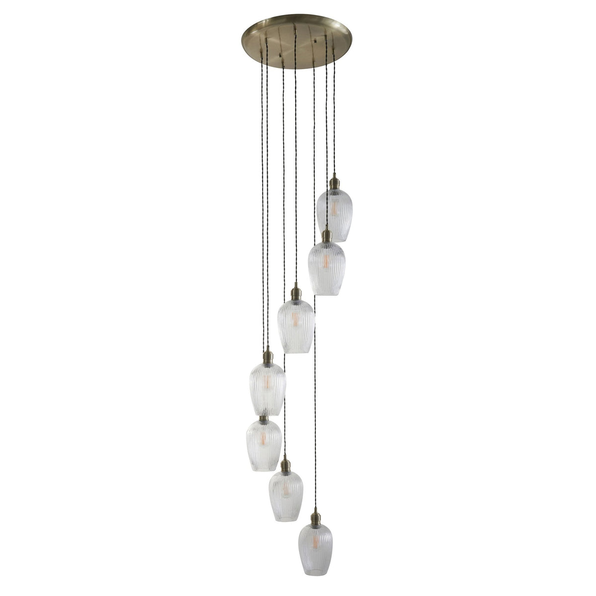 A full-length view of the seven-light cluster pendant, showcasing its varying cable lengths and textured glass shades.