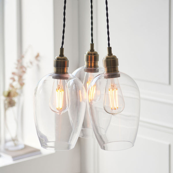 Hoburne 3 Light Cluster Pendant in Antique Brass with Clear Glass