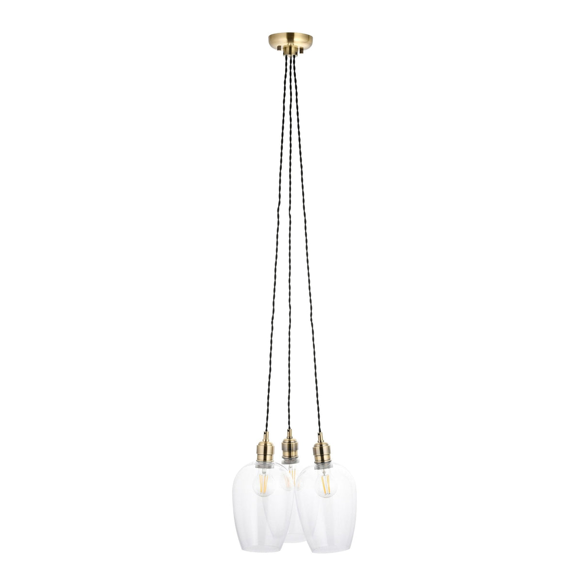 Studio shot of three clear glass pendant lights with brass fittings and braided cords on a white background.