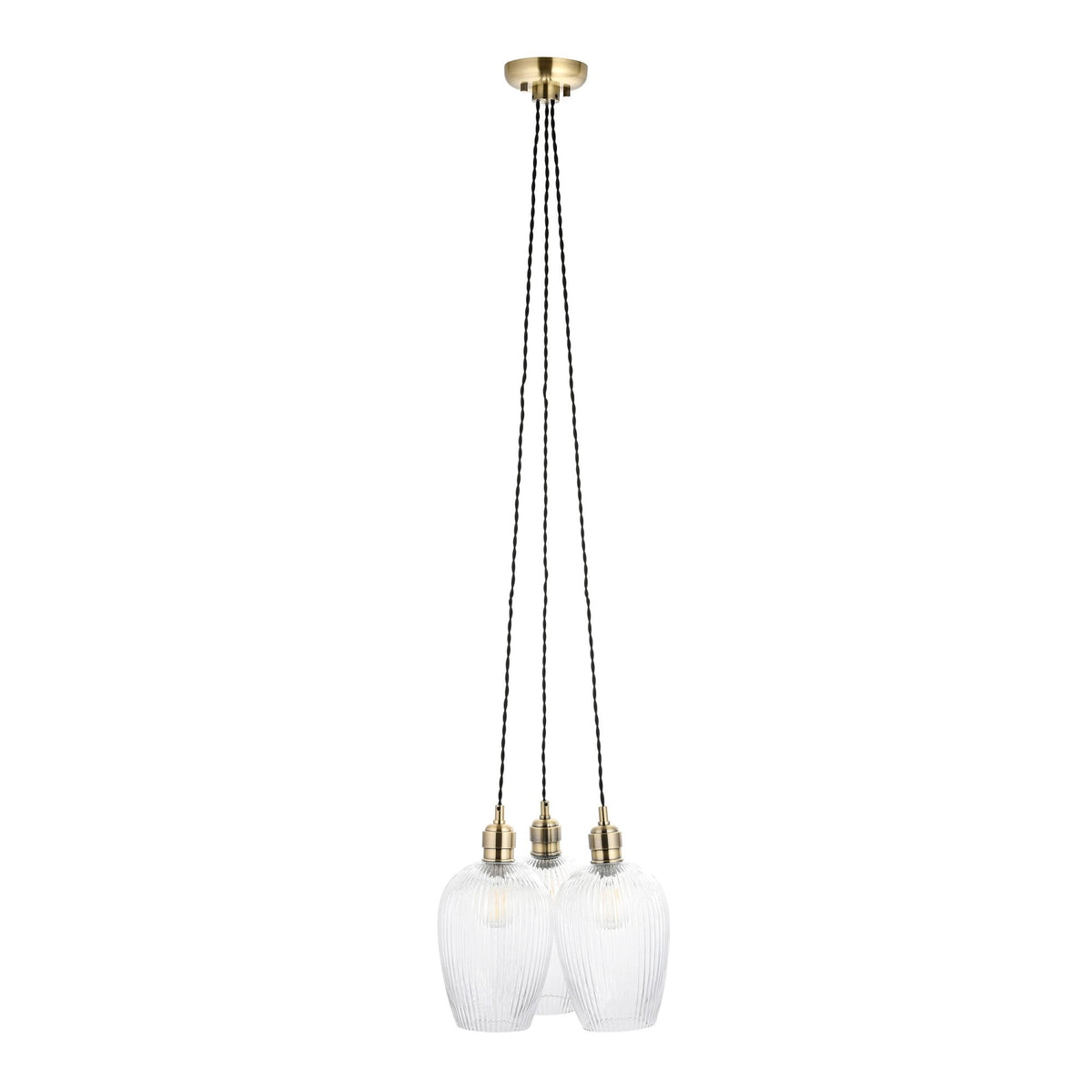 Studio shot of the three ribbed glass pendant lights with brass fittings on a white background.