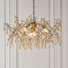 Tuxford Four Light Branch Chandelier in Aged Gold with Champagne Lustre Glass Droplets