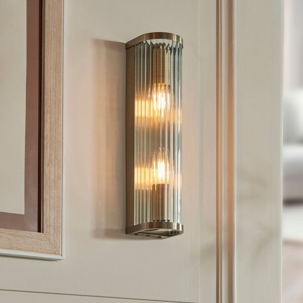 Ridgeton Twin Lamp Wall Light in Antique Brass & Clear Ribbed Glass