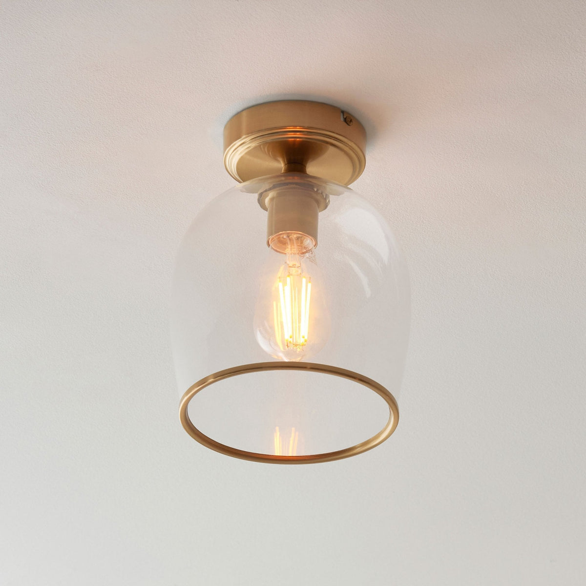 Ashcroft Flush Ceiling Light in Brushed Aged Brass & Clear Glass Shade with Metal Trim Edge