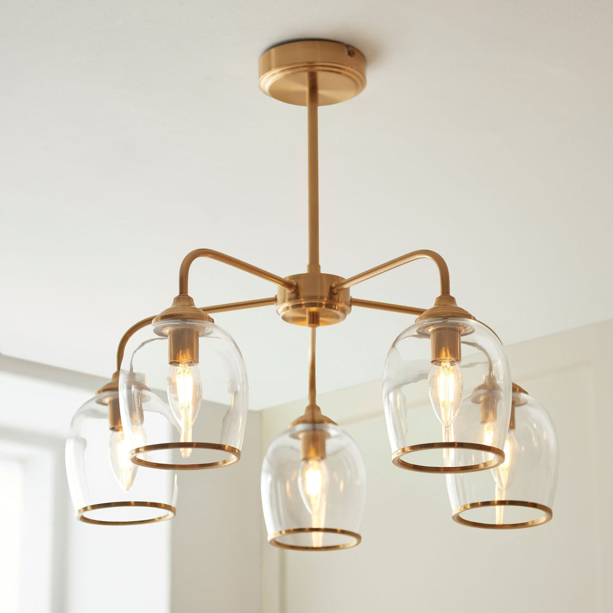Ashcroft Five Light Pendant in Brushed Aged Brass & Clear Glass Shades with Metal Trim Edge