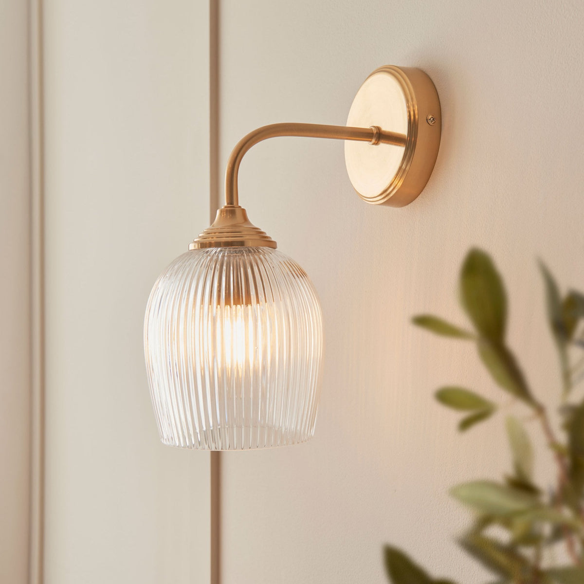 Ashcroft Wall Light in Brushed Aged Brass & Clear Ribbed Glass Shade