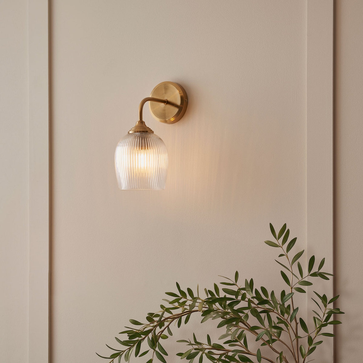 Ashcroft Wall Light in Brushed Aged Brass & Clear Ribbed Glass Shade