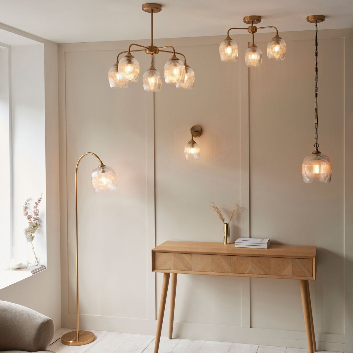 Ashcroft Wall Light in Brushed Aged Brass & Clear Ribbed Glass Shade