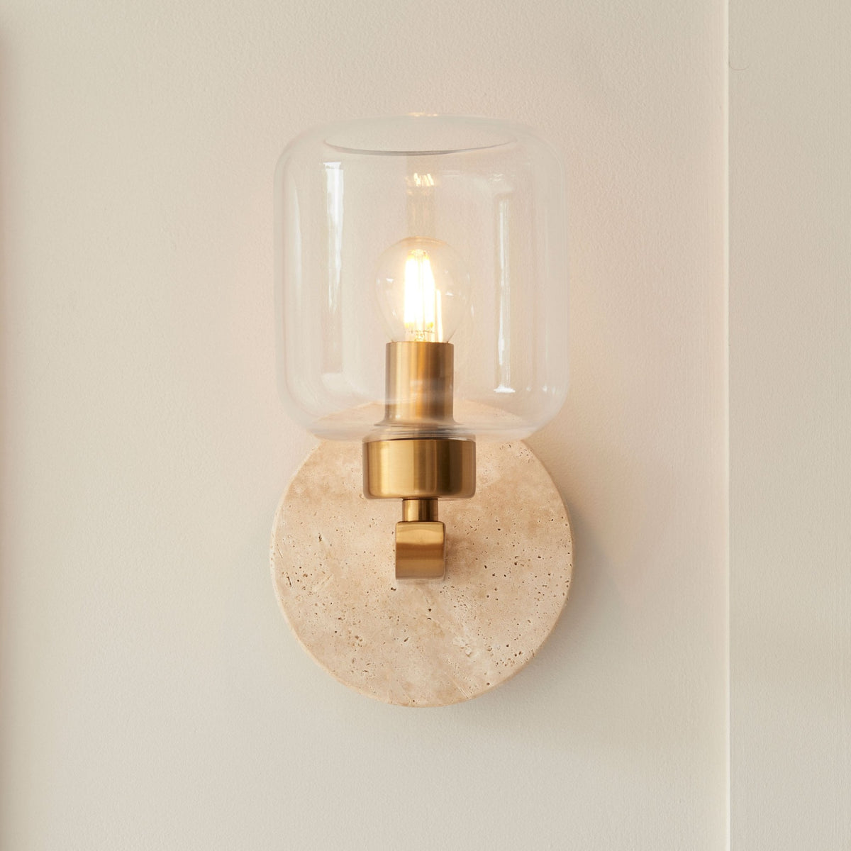 Travi Wall Light in Vintage Brass & Natural Travertine Stone with Clear Glass Shade