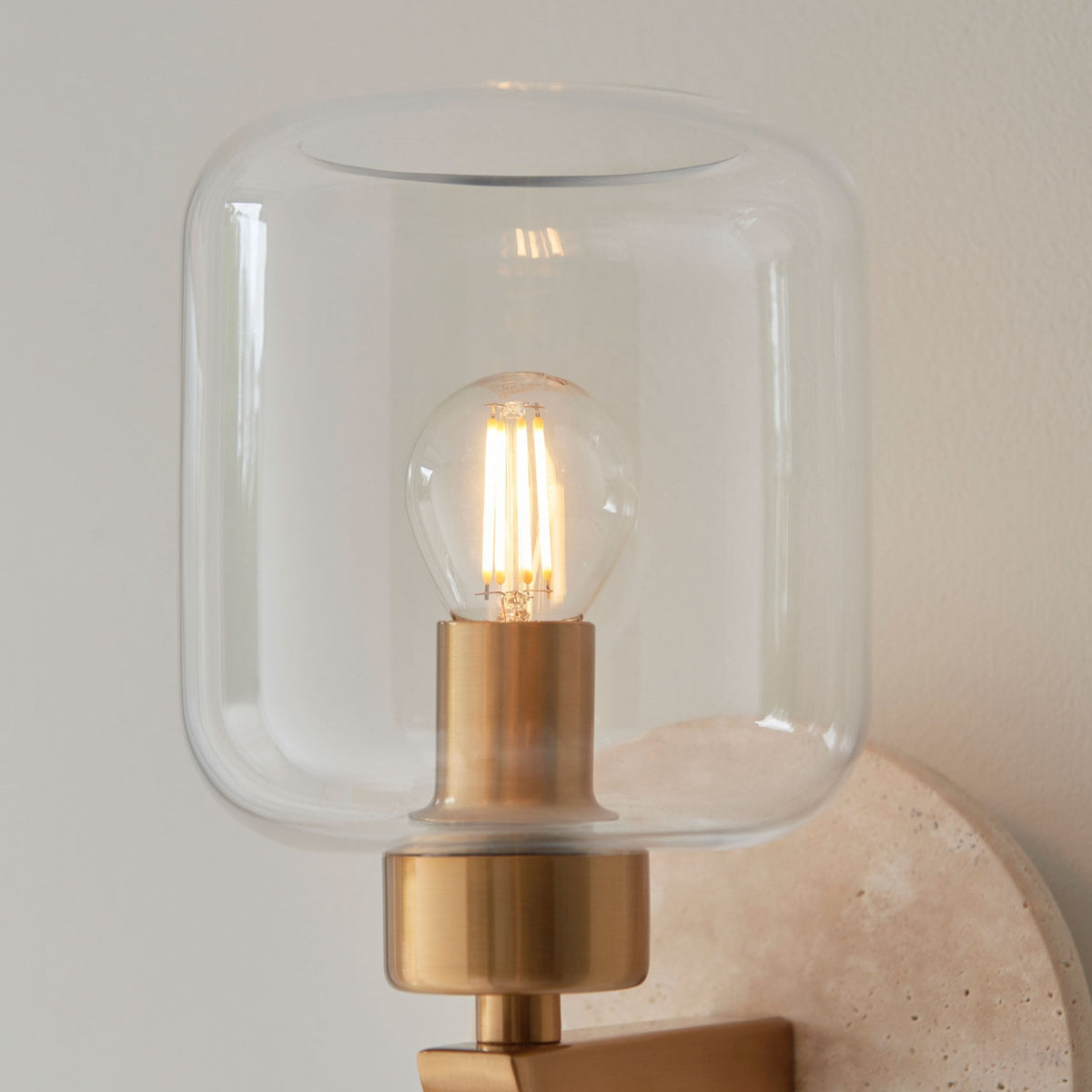 Travi Wall Light in Vintage Brass & Natural Travertine Stone with Clear Glass Shade