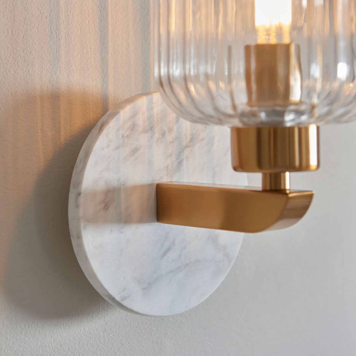 Travi Wall Light in Vintage Brass & White Volakas Marble with Clear Ribbed Glass Shade