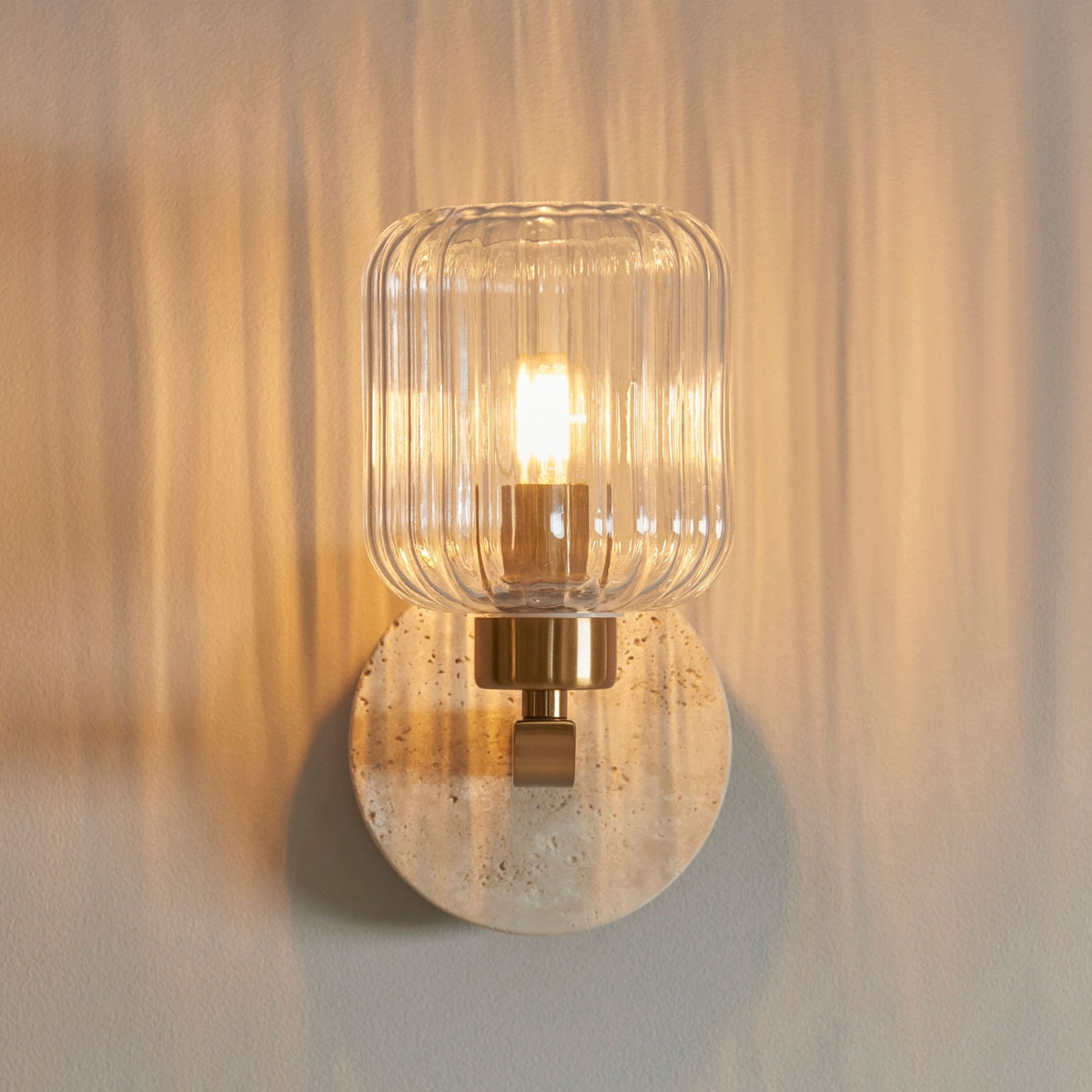 Travi Wall Light in Vintage Brass & Natural Travertine Stone with Clear Ribbed Glass Shade