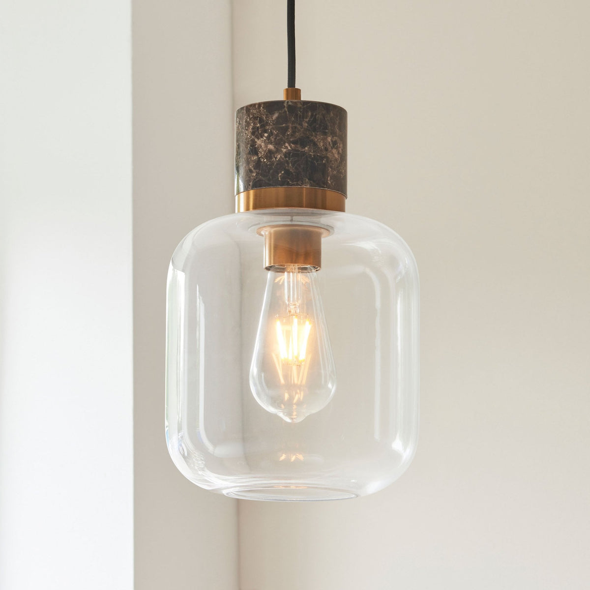 Travi Single Drop Pendant in Vintage Brass & Dark Brown Emperador Marble with Clear Glass Shade