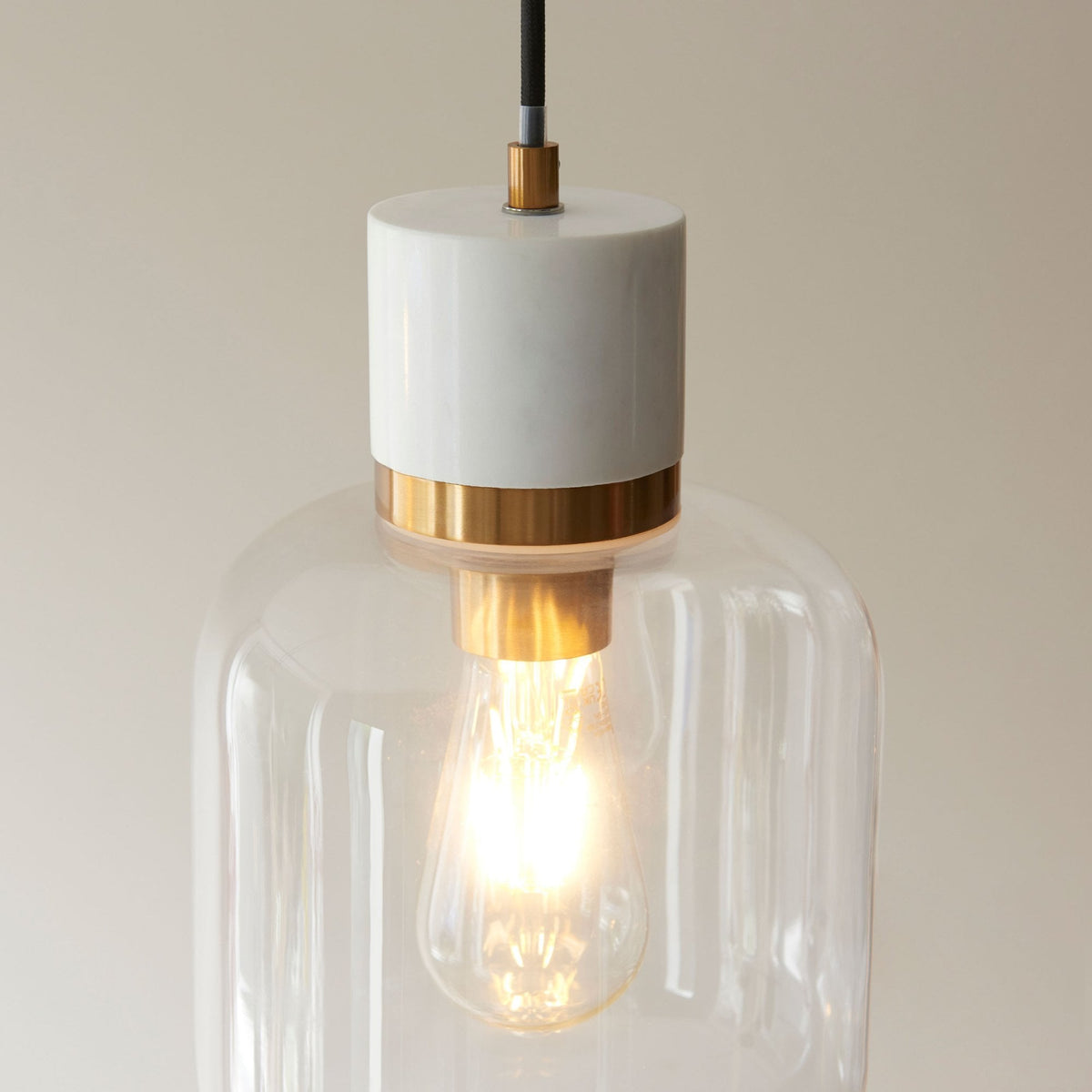 Travi Single Drop Pendant in Vintage Brass & White Volaskas Marble with Clear Glass Shade