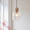 Travi Single Drop Pendant in Vintage Brass & Natural Travertine Stone with Clear Ribbed Glass Shade