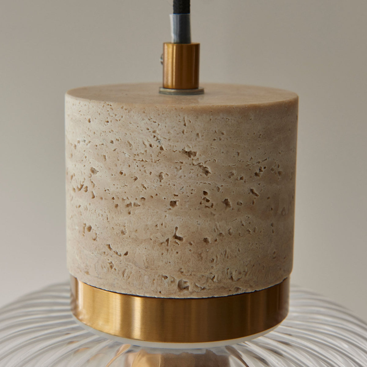 Travi Single Drop Pendant in Vintage Brass & Natural Travertine Stone with Clear Ribbed Glass Shade