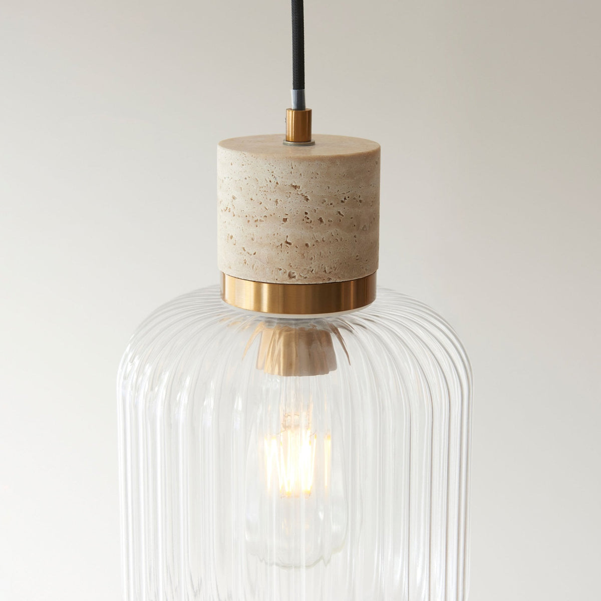 Travi Single Drop Pendant in Vintage Brass & Natural Travertine Stone with Clear Ribbed Glass Shade