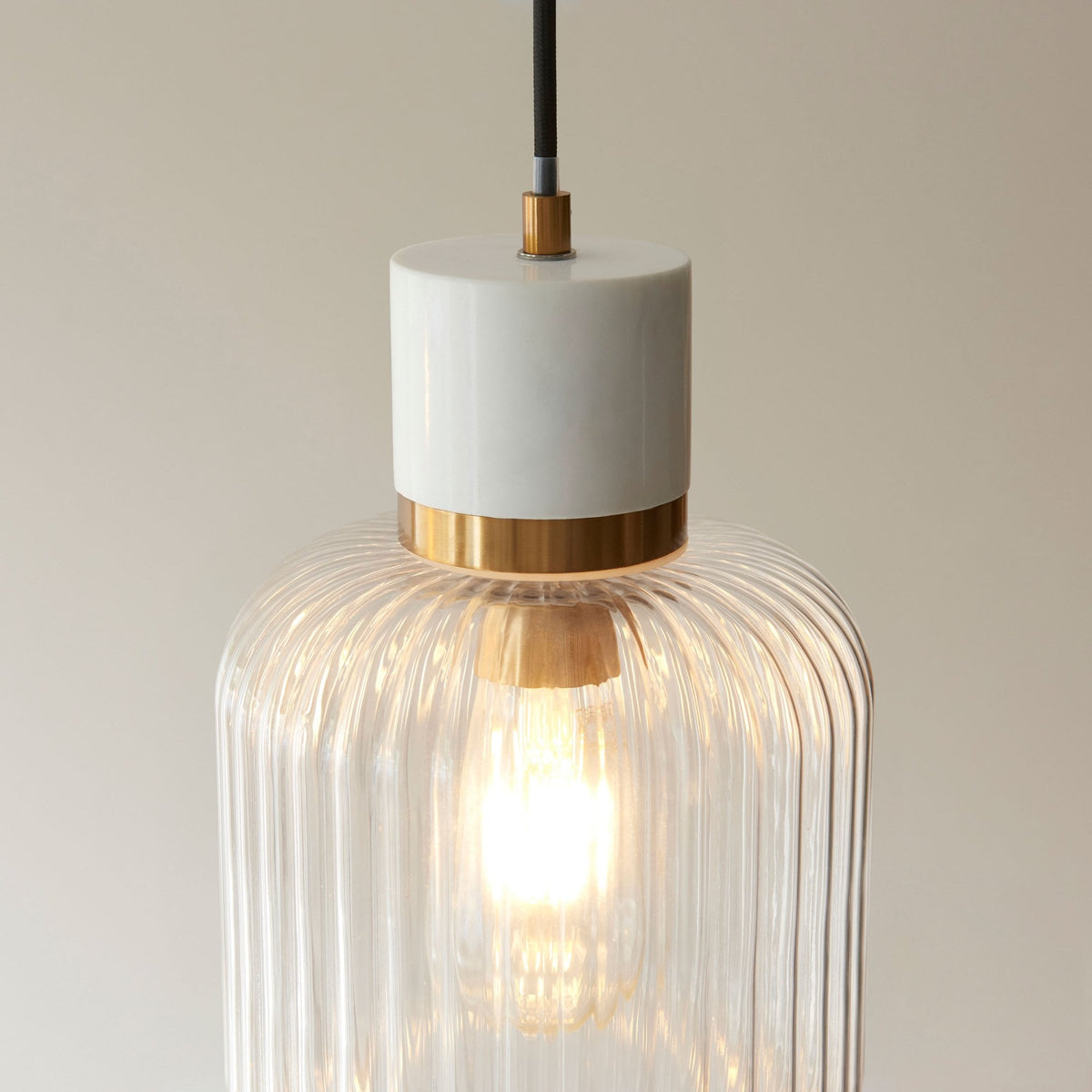 Travi Single Drop Pendant in Vintage Brass & White Volaskas Marble with Clear Ribbed Glass Shade
