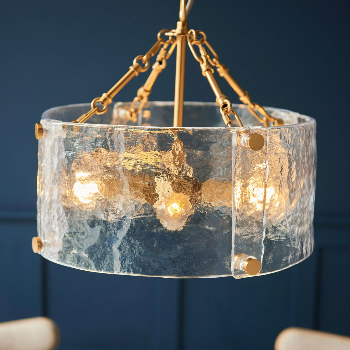 Keller Four Lamp Pendant in Brushed Aged Brass with Handmade Clear Textured Curved Glass Panels
