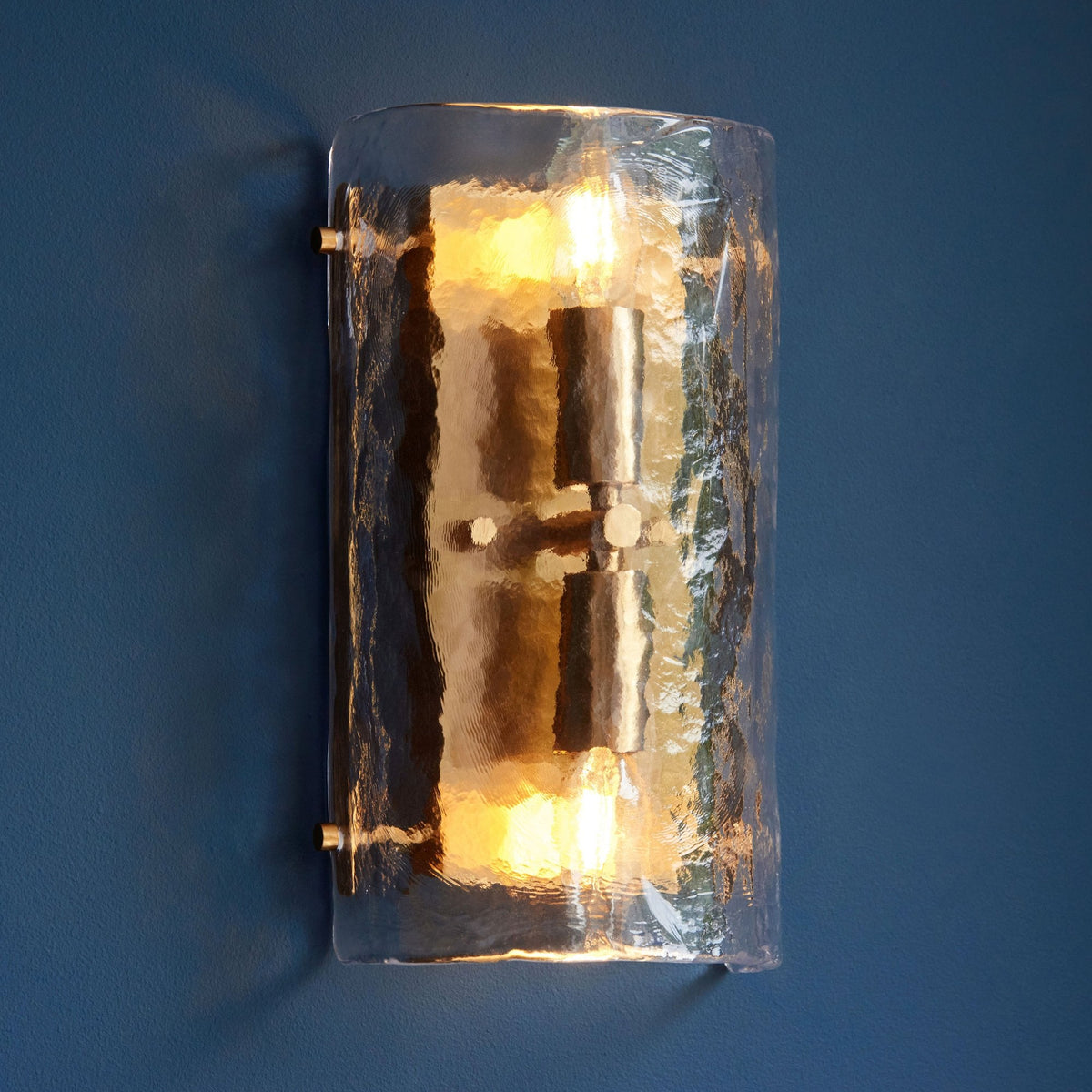 Keller Wall Light in Brushed Aged Brass with Handmade Clear Textured Curved Glass Panel