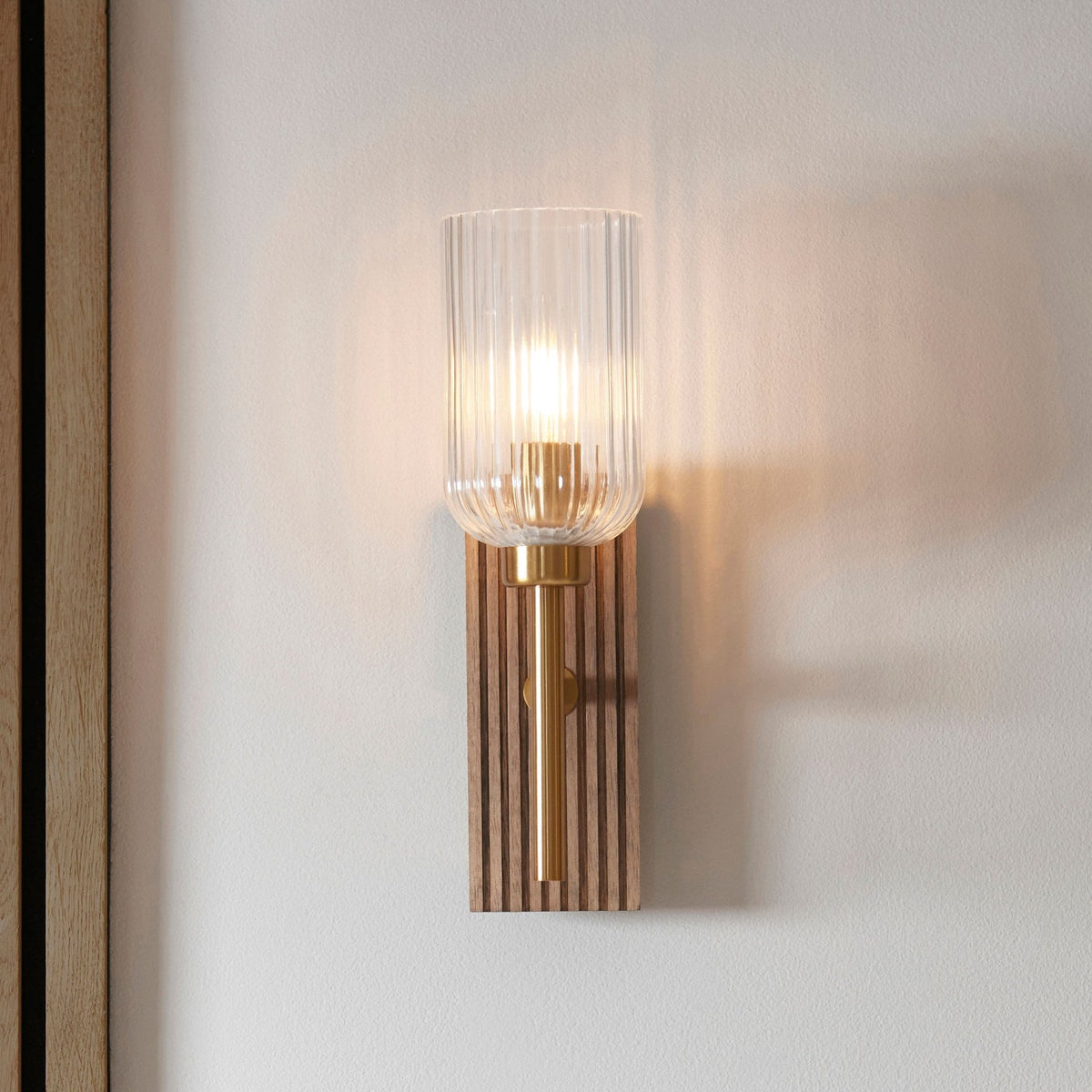 Grove Wall Light in Vintage Brass & Grooved Stained Beechwood Backplate with Clear Ribbed Glass