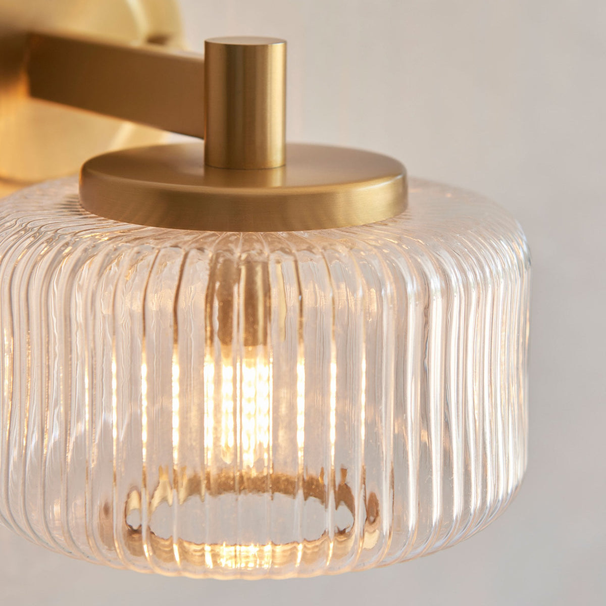 Stamford Wall Light in Brushed Aged Brass & Clear Ribbed Glass Shade with Plated Metal Trim
