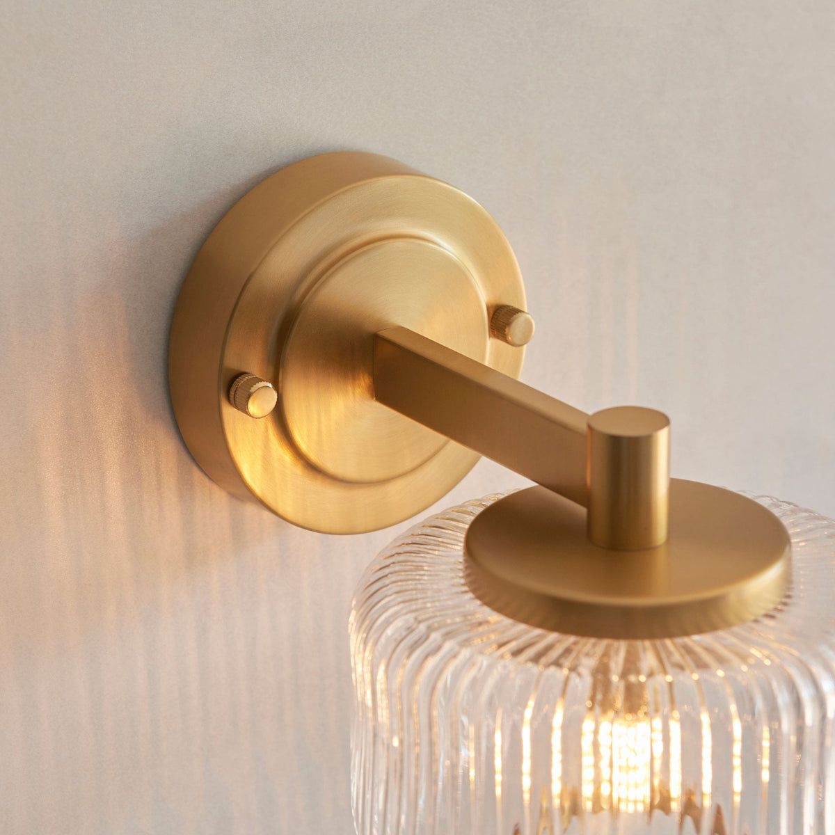 Stamford Wall Light in Brushed Aged Brass & Clear Ribbed Glass Shade with Plated Metal Trim